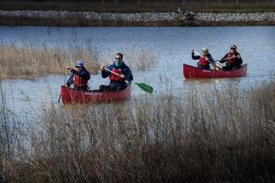 Visitors paddle through a portion of Howard Marsh, the site of a NOAA-supported habitat restoration project in Ohio. (Credit: Metroparks Toledo)