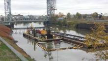 Mechanical dredging of contaminated sediment in the Buffalo River. (Credit: Brian Murphy)