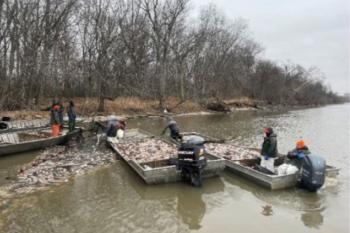 photo of a group of fishing boats contract fishing on the Illinois River