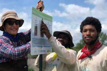 Installation of educational signage explaining changing water levels in this coastal wetland and opportunities for the public to document conditions via their cell phone cameras