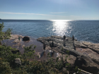 Students explore the lakeshore on a canoe trip supported by the Red Cliff Band of Lake Superior Chippewa and partner Apostle Islands National Lakeshore Park. The trip was one part of the project Nibi gaa-gikinoo’amaage, Nibi gaa-bimaaji’iwemagak (Water Will Teach, Water Will Give Life). (Credit: Alex Breslav)