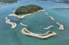 Sugar Island in Michigan. The water surrounding the island is clear.  